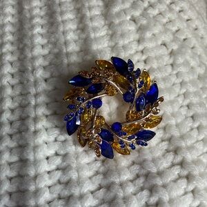 Elegant Blue and Gold Brooch